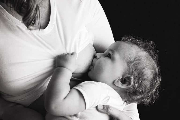 Mother breastfeeding her child