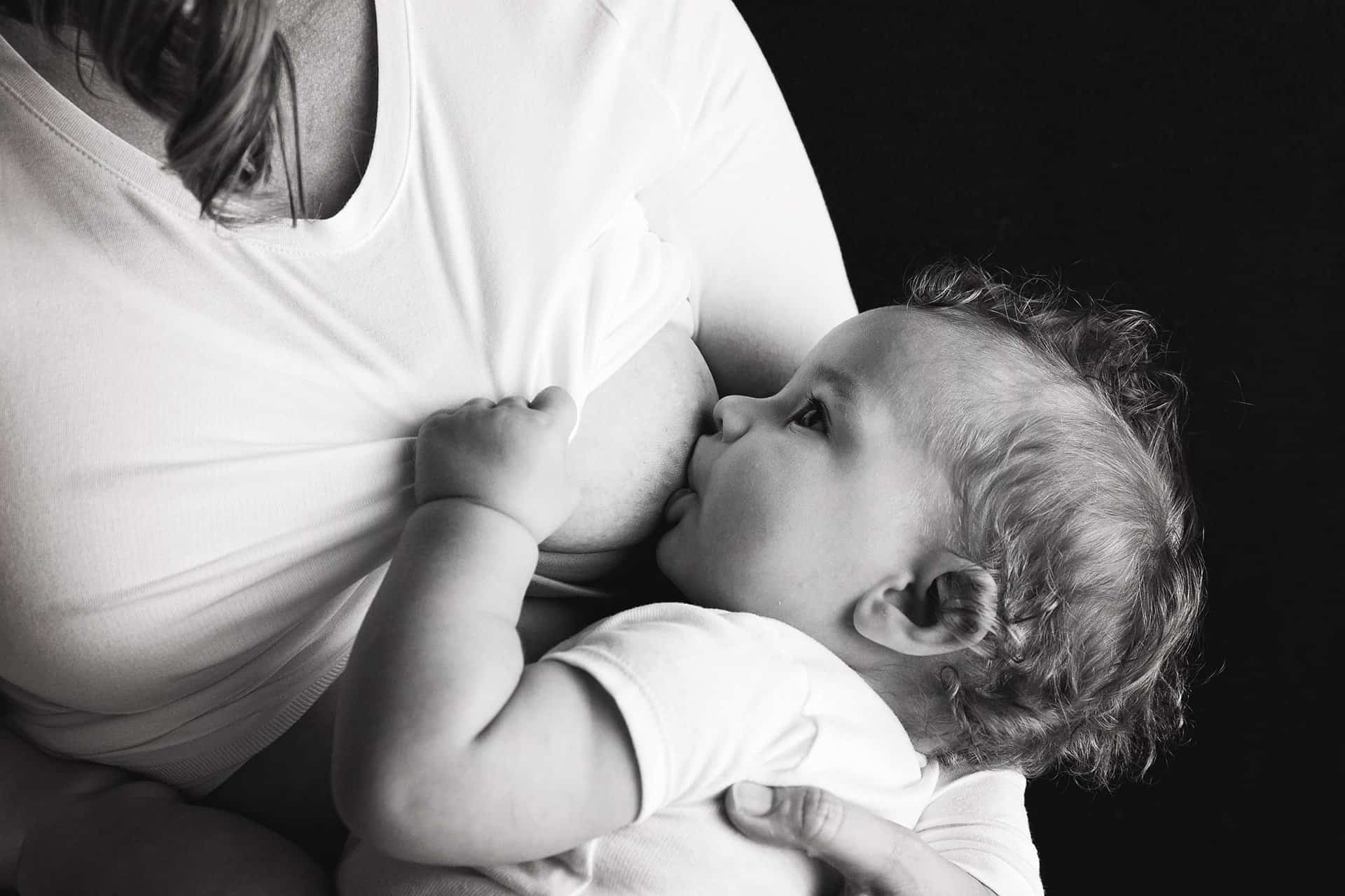 Mother breastfeeding her child