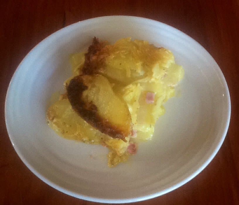 Serving of Microwave Potato Bake on a white plate