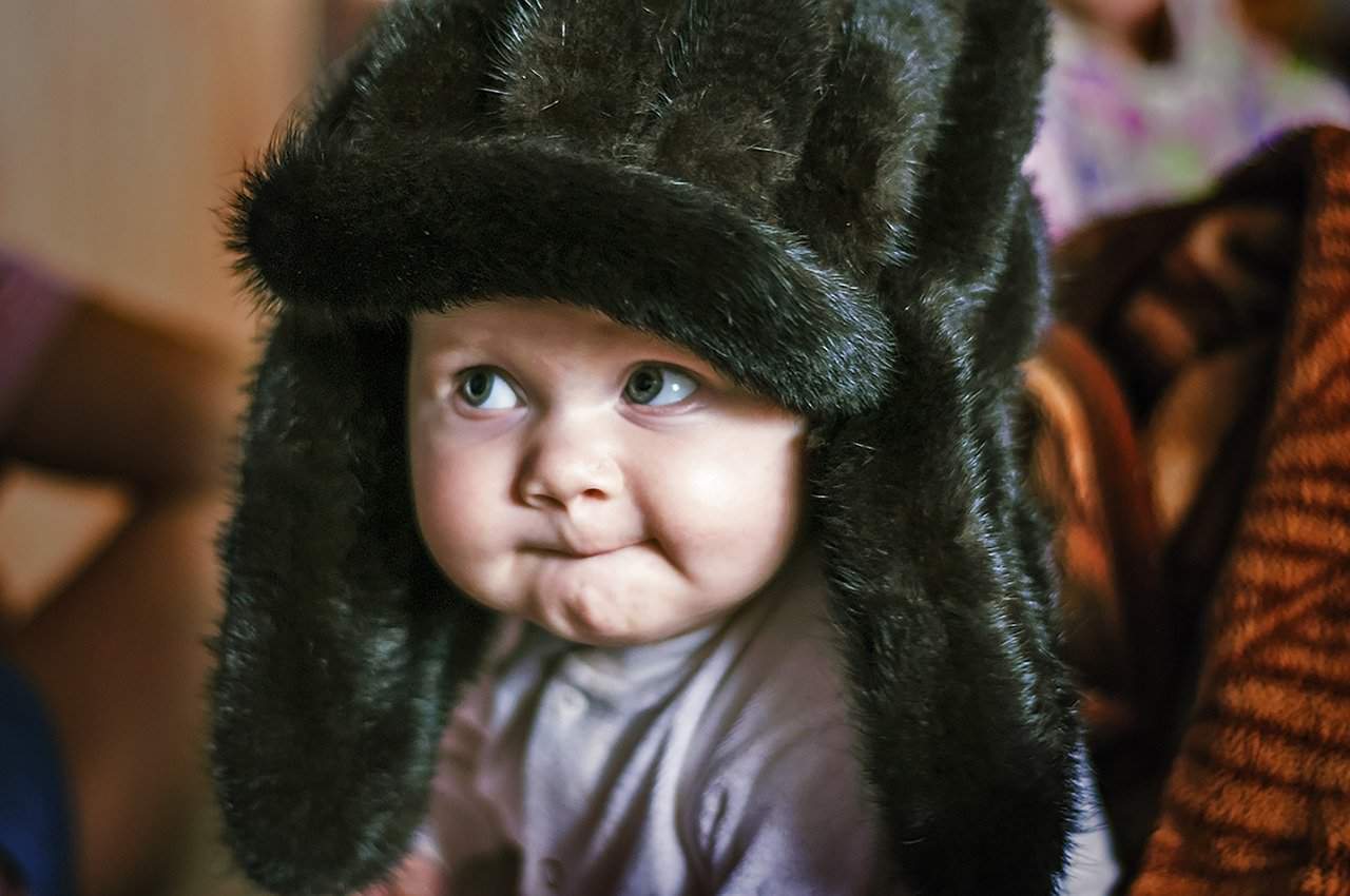 Baby in trapper hat