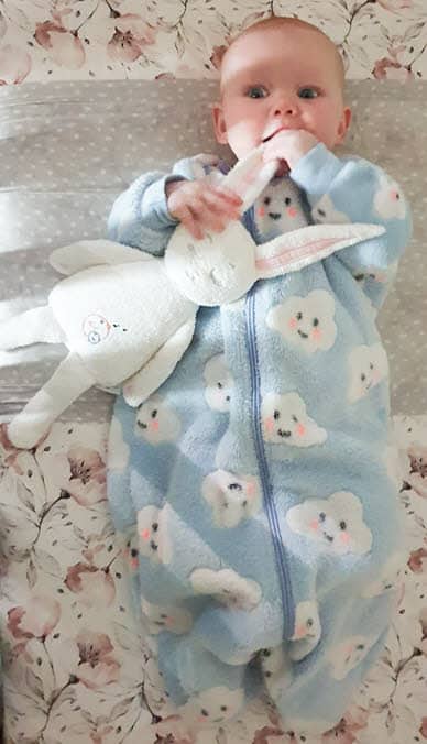 Baby chewing Bibis bunny ear