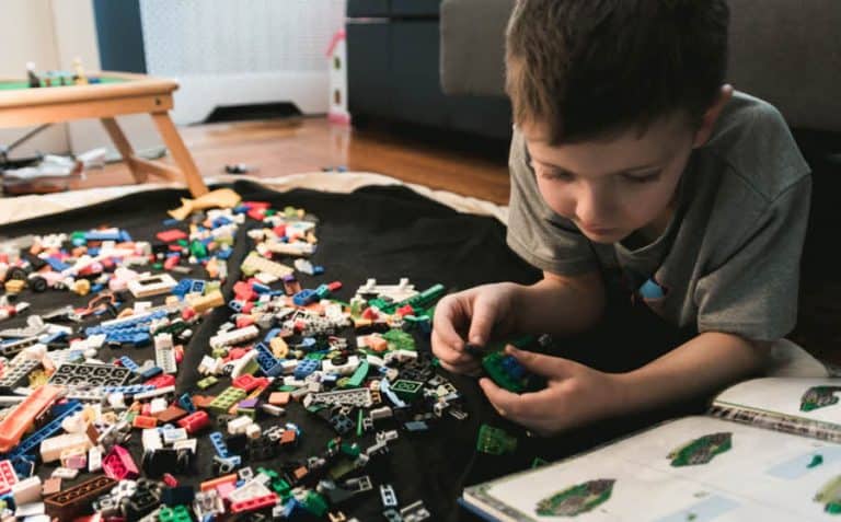 Boy playing with lego