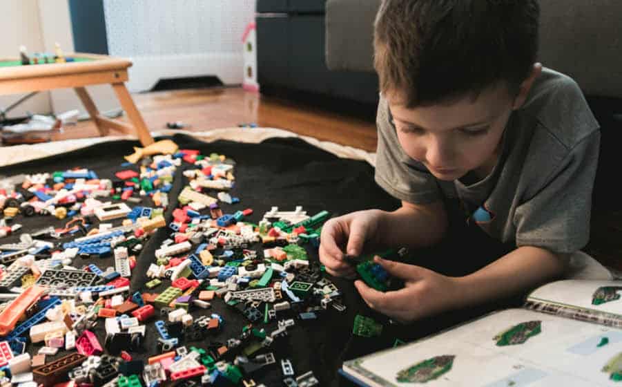 Boy playing with lego