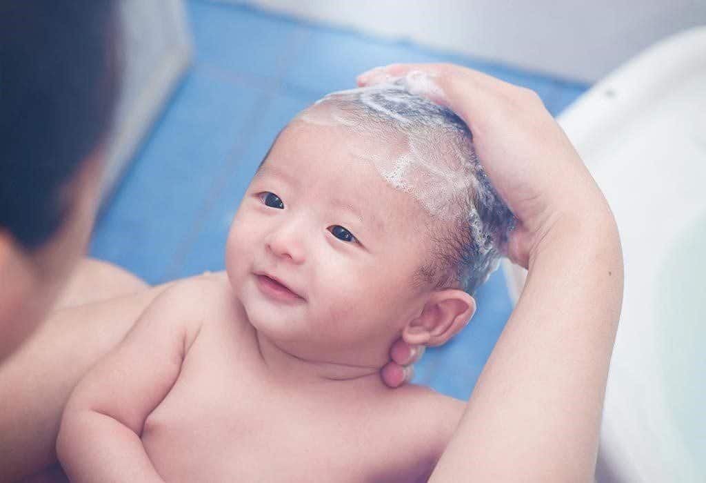 Baby hair being washed