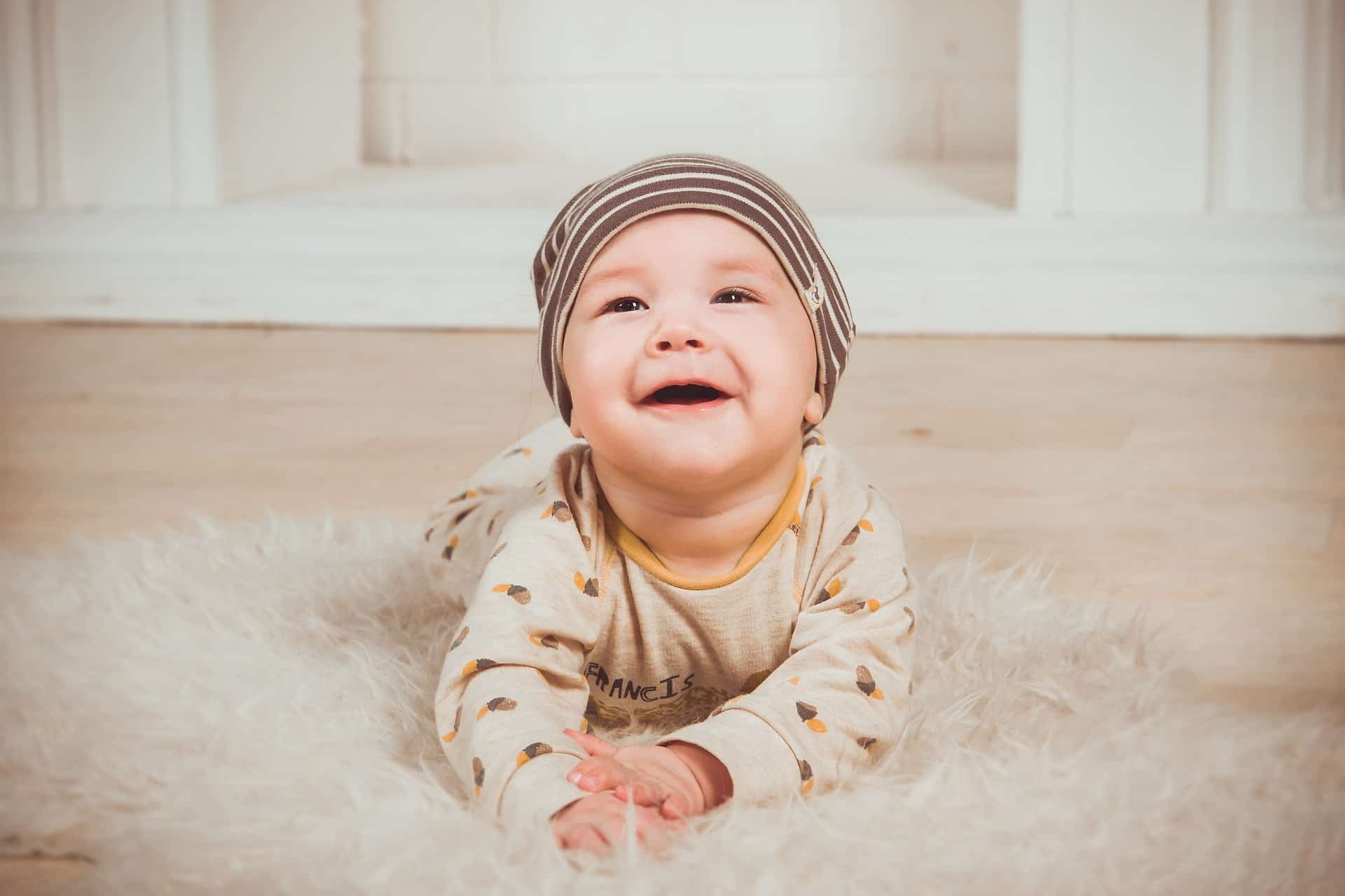 cute baby laughing - I wonder whether he or she has a unique baby name?