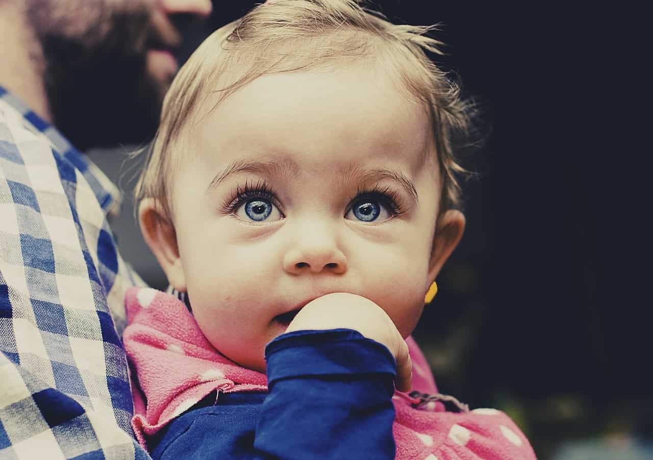 Baby with pretty eyes looking up - do they have a unique baby name like Cassidy?