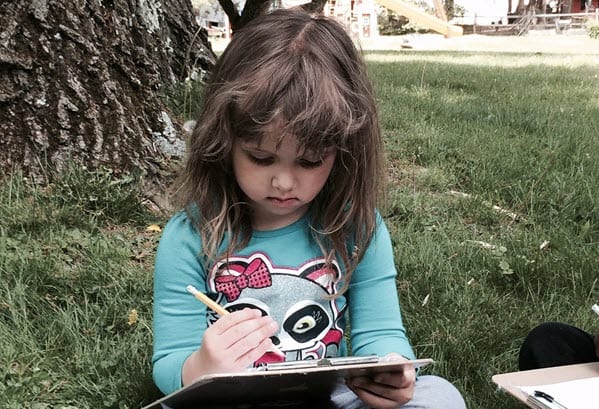 girl writing letter to santa