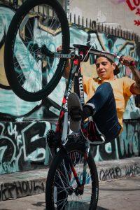 Grown up son riding a bicycle