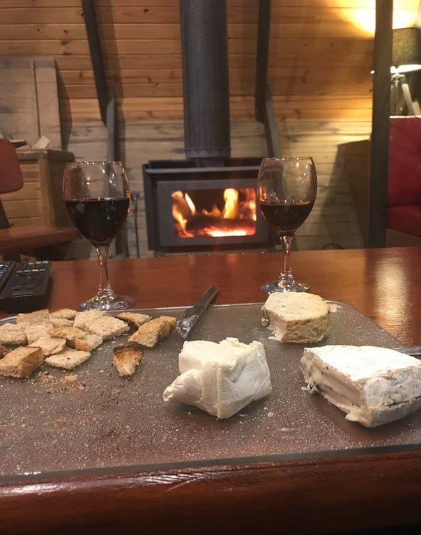Wine and cheese inside the chalet at the Mouses House