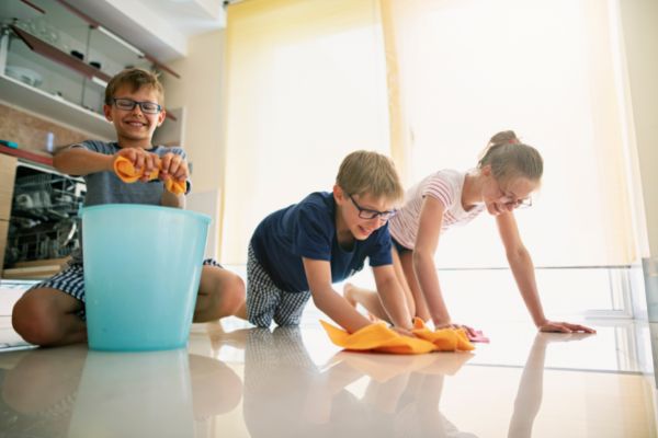 Kids Cleaning Happily At Home