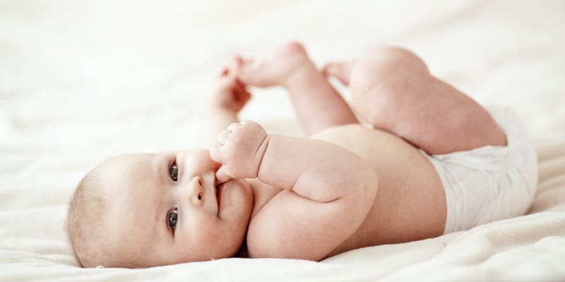 checking baby for symptoms of eczema