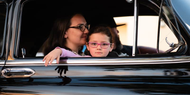 Family traveling in a car