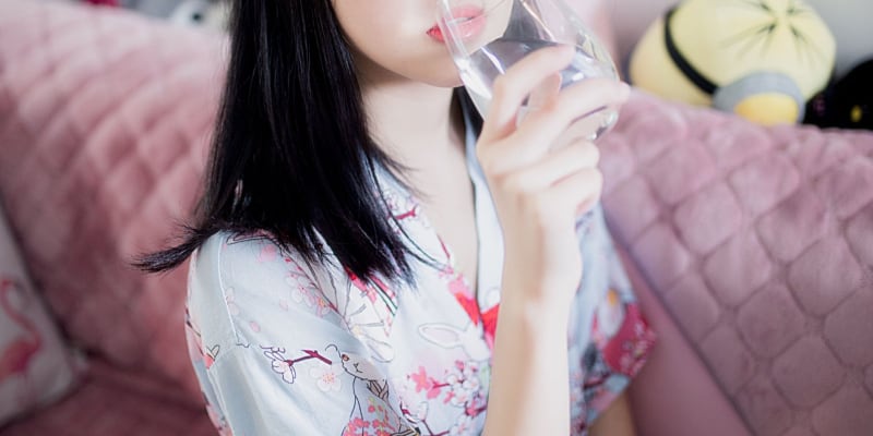Woman drinking a glass of water