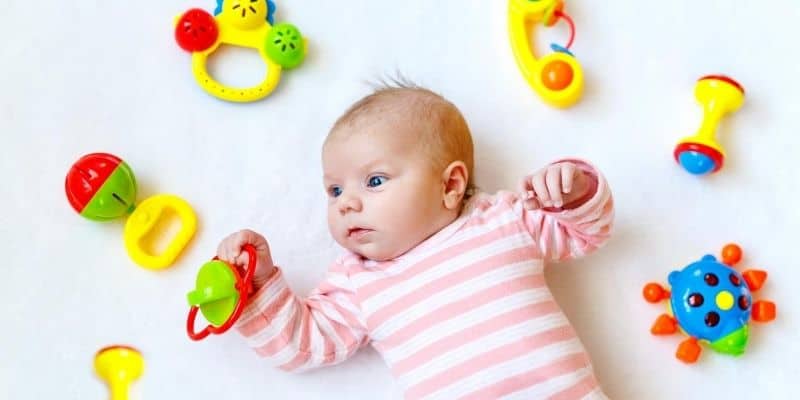 Child with baby toys