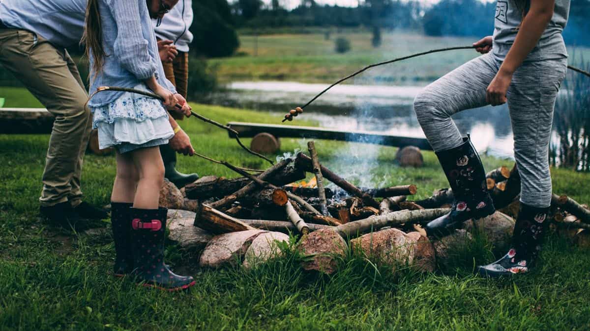 Family camping - roasting over a fire