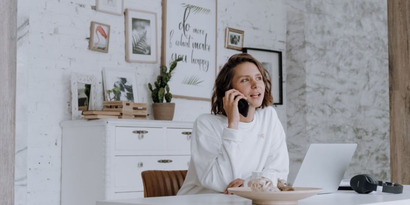 woman on the phone working at home