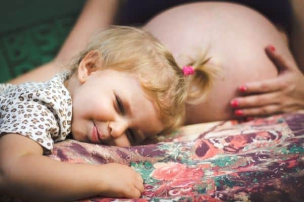 Pregnant woman and kid