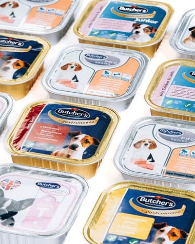 Dog food cans showing labels with ingredients