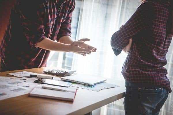 Couple arguing in the office