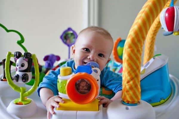 Baby on a colourful activity walker