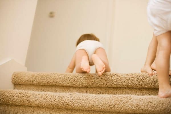 Babies on top of stairs