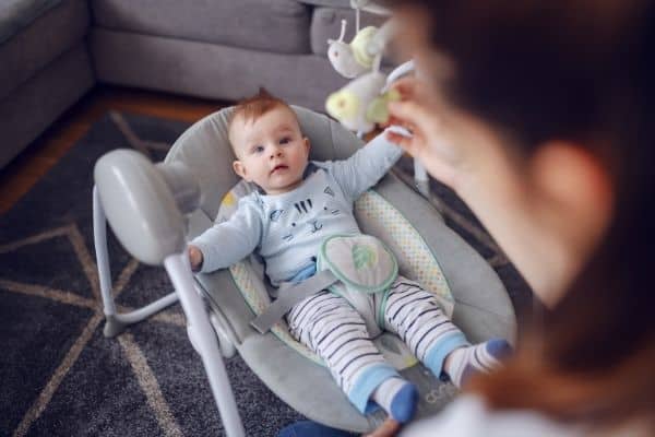 Adorable baby on bouncer