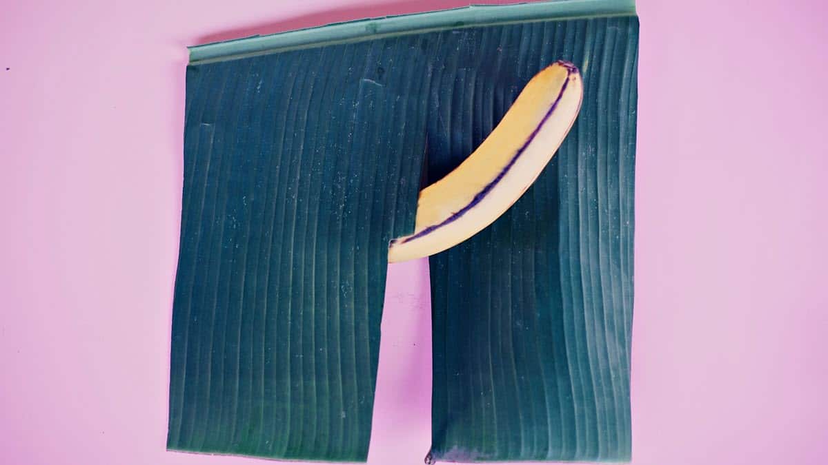 Banana on purple background