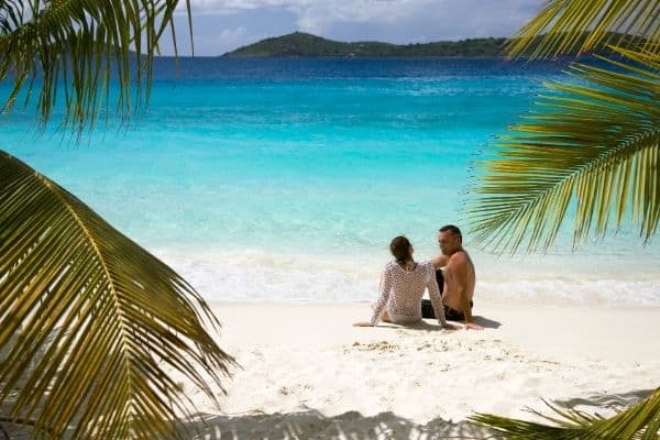 Couple on white sand beach