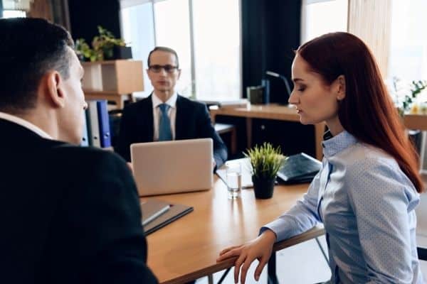 Divorce attorney communicating with clients