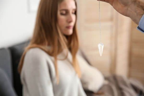 Woman on session with a professional hypnotherapist