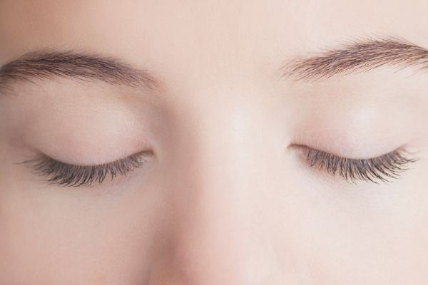 Person with closed eyes