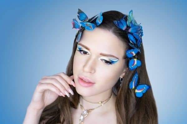 Pretty woman wearing neon butterfly clips