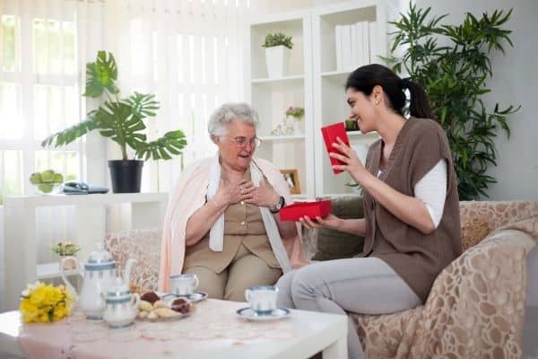 Giving homemade present to parent
