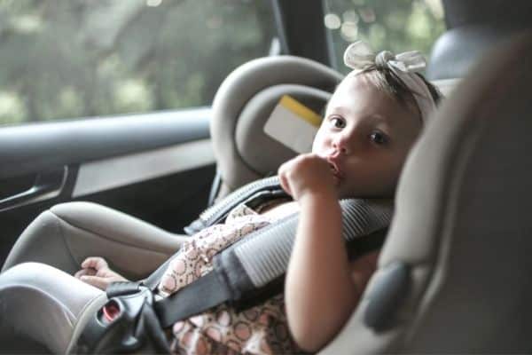 Child sitting on Booster Car Seat
