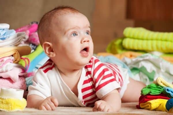 baby with baby stuffs