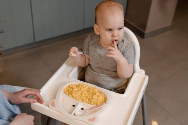 toddler on high chair