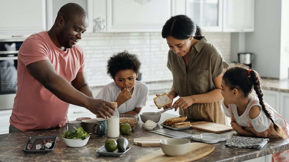 Parents with kids in kitchen