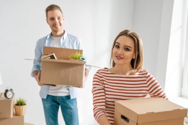 couple with moving boxes
