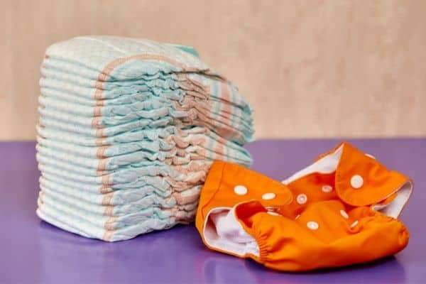 disposable and reusable nappies on a table