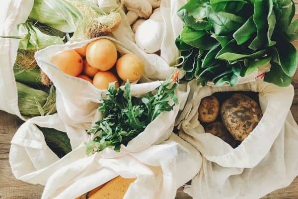 grocery items in reusable bags