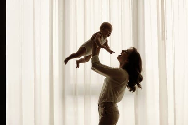 mother and baby playing