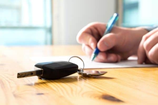 person with car keys
