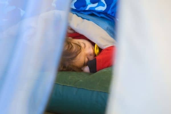 baby camping in family tent