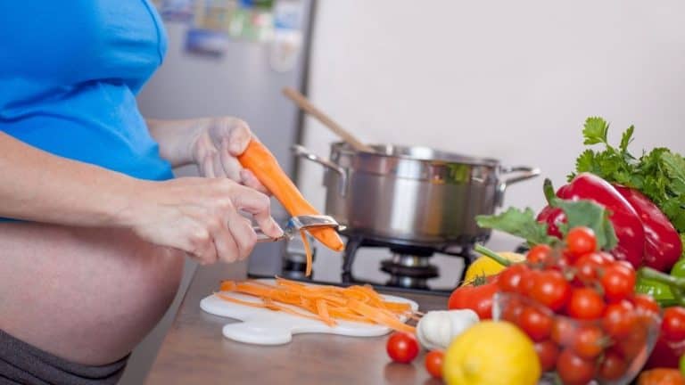 Pregnant woman cooking Healthy