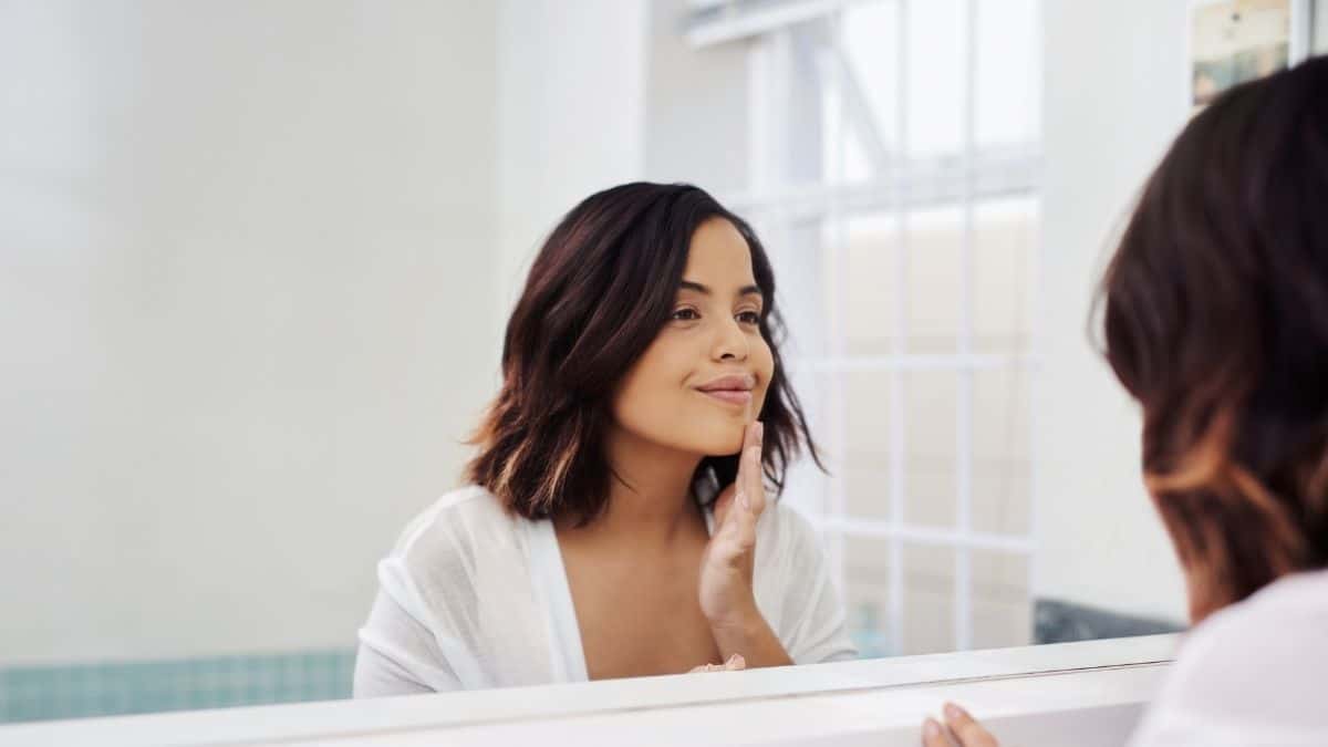 woman in front of a mirror