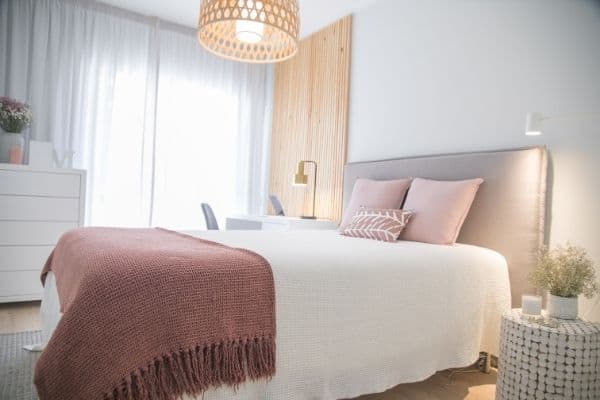 brown and white bed linen