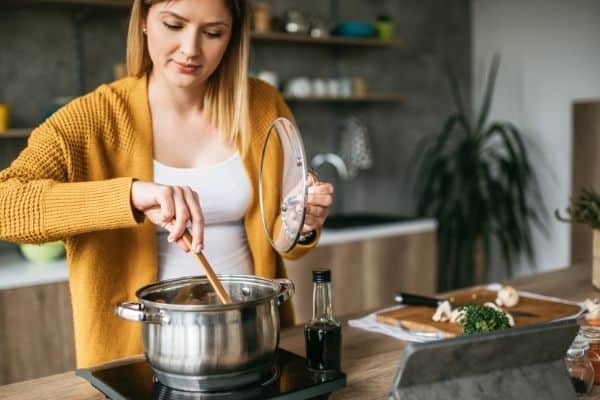 pregnant woman cooking