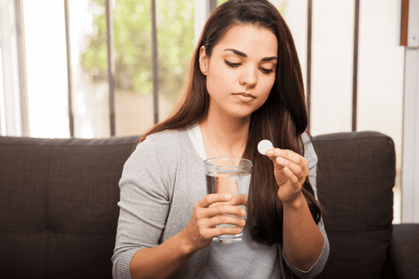 taking antacid