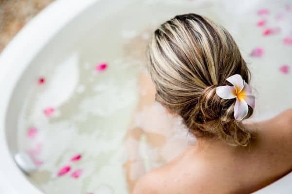 woman on a bathtub