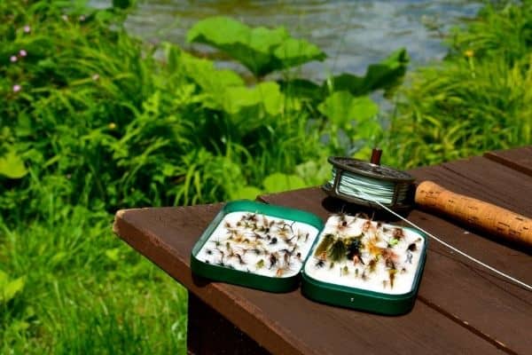 fishing tackle on a wooden table